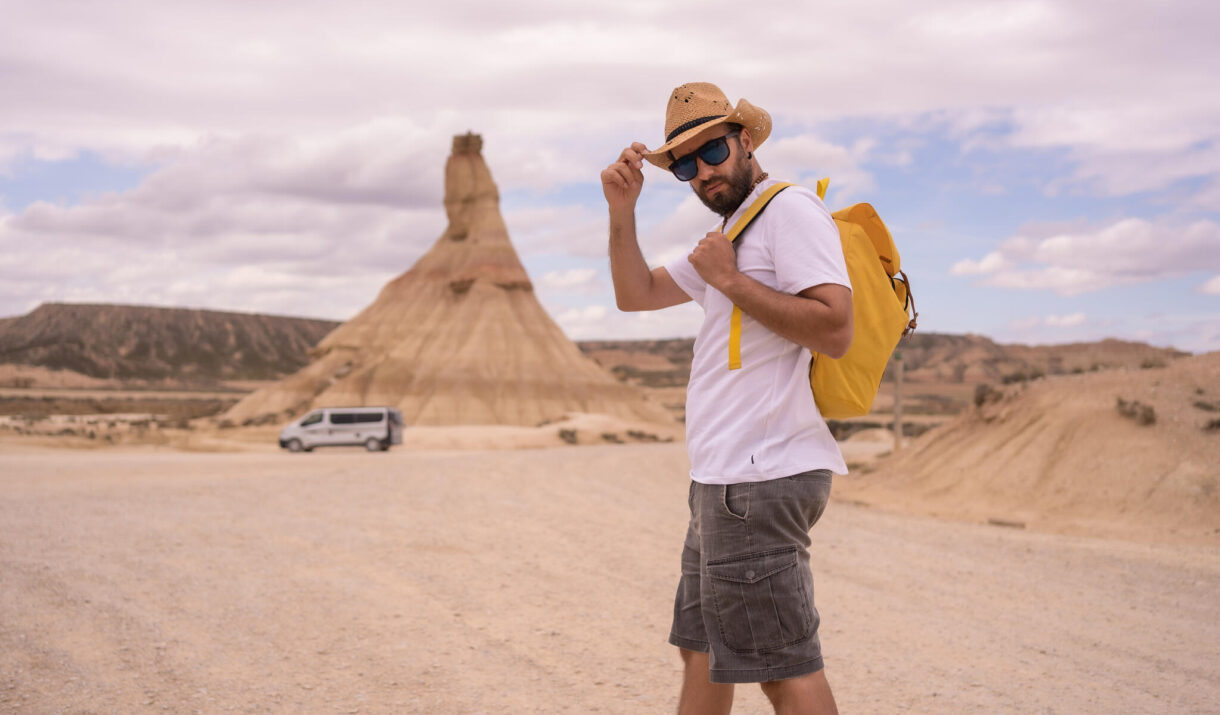 explorer in an arid national park looking at camer 2023 11 27 04 57 26 utc easy resize.com